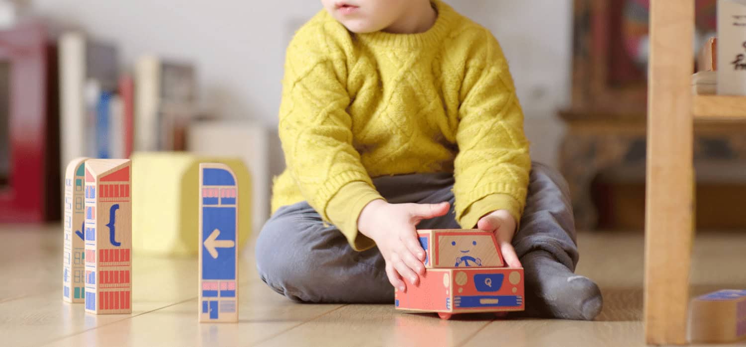 Wooden blocks teach coding through tactile, off-screen play