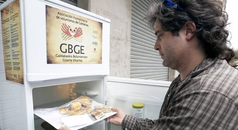 In Spain, shared fridge helps residents tackle food waste and hunger